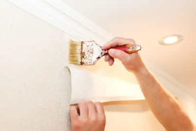 Pose de papier peint à Cholonge — revêtements muraux et toiles de verre